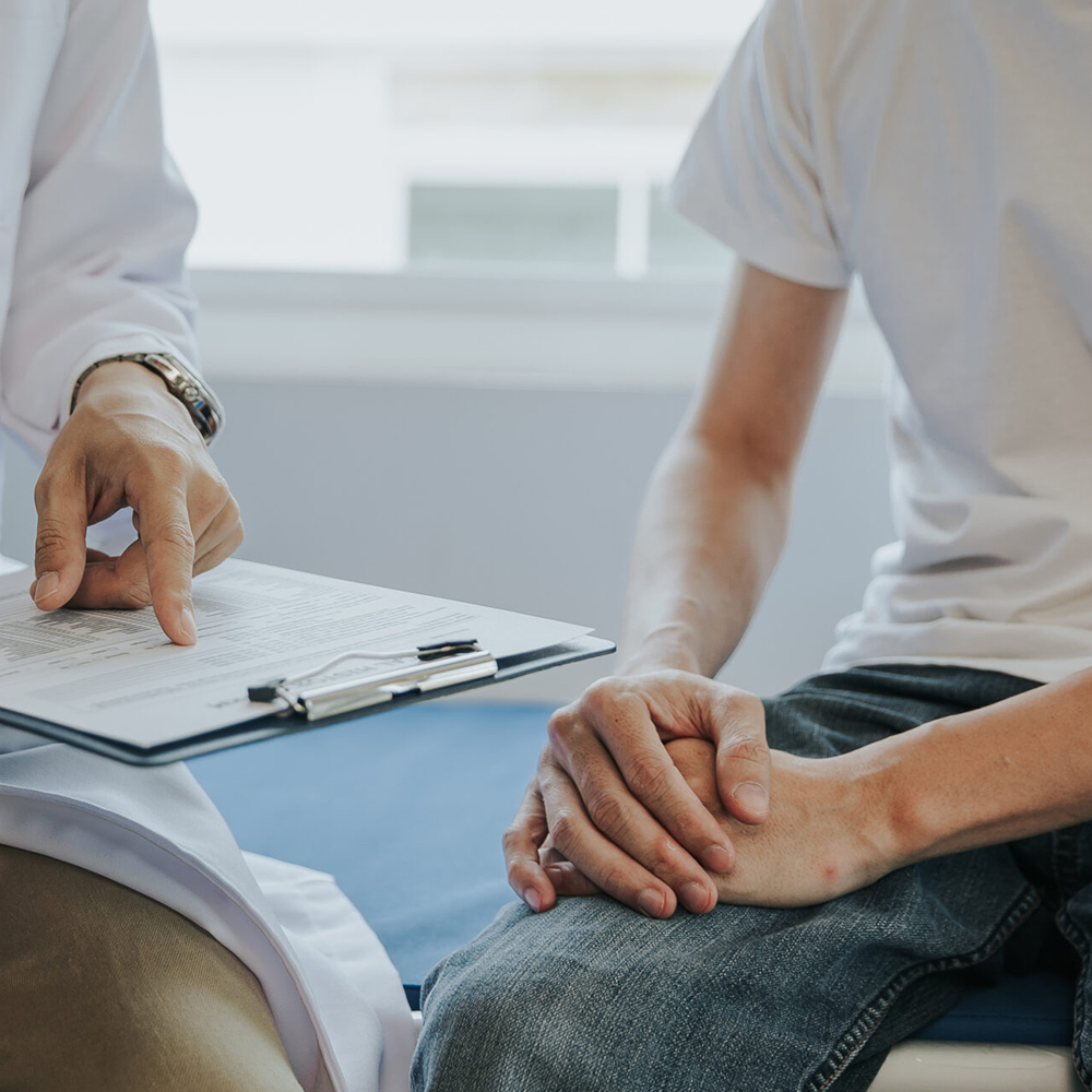 Doctor with male patient