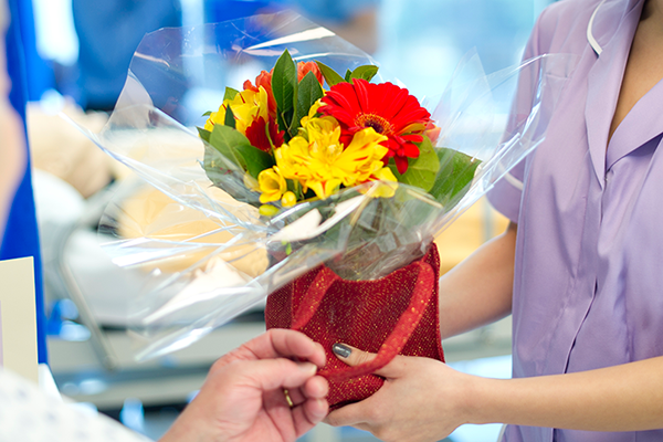 Volunteer with flowers