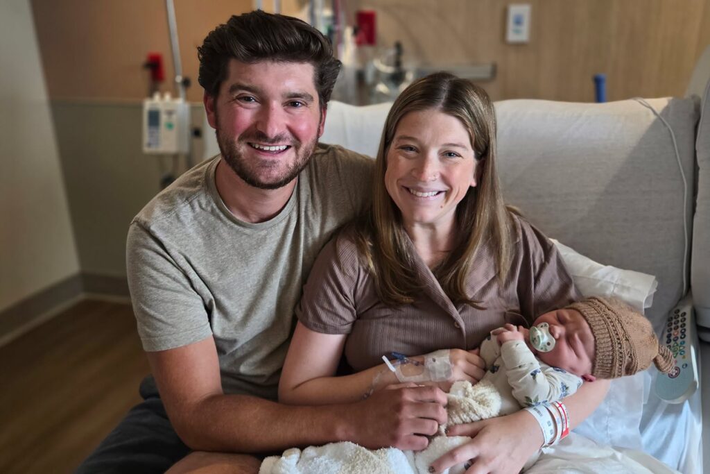 Family holding baby at Margaret Mary Health